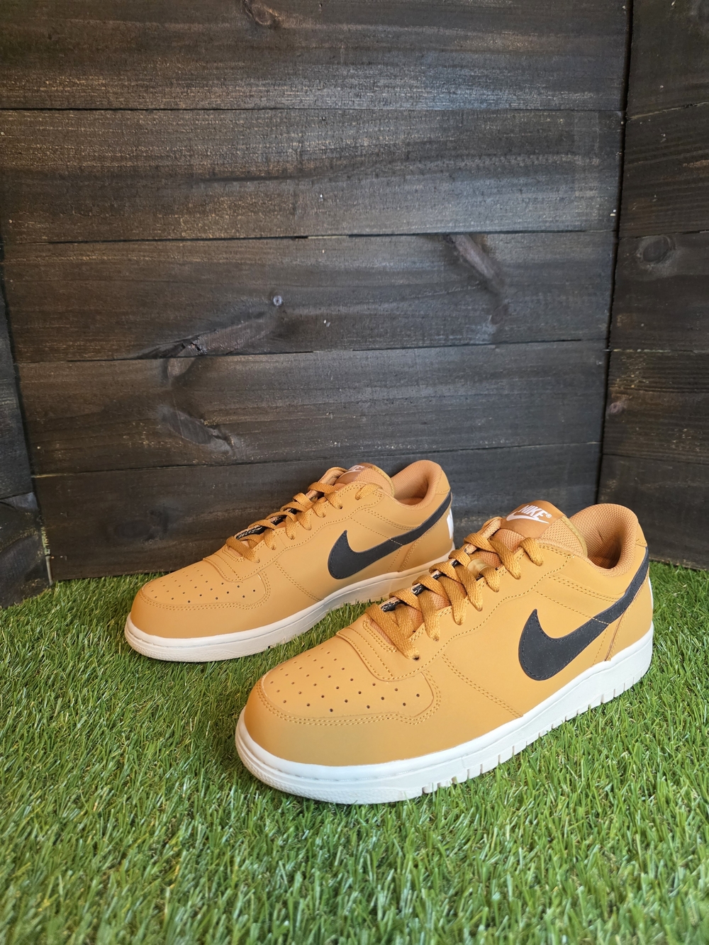 Nike Men's Low-Top Sneakers in Orange with Black Swoosh
